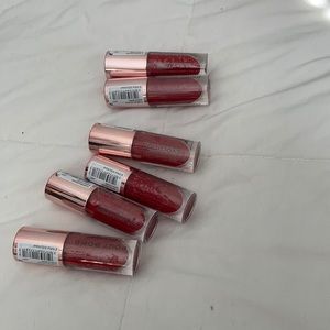 REVOLUTION LIP PLUMPING GLOSS SEALED
